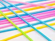 Colorful straws isolated on white background.