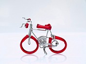 A red miniature bike handicraft model from Thailand.