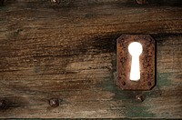 Detail of an Old Door with Rusty Keyhole. Civita di Bagnoregio, Viterbo District, Lazio, Italy.
