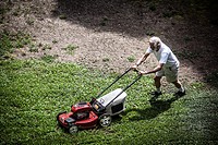 Man mowing the lawn.