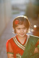 Portrait of an indian american girl playing outdoors.