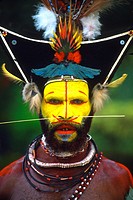 Colorful Huli Wigmen with Yellow Face In Papua New Guinea.