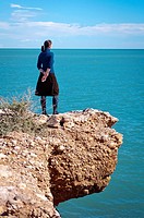Pensive woman in Vinaroz coast Spain