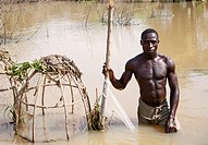 Portrait Of fisherman Fishing In River Niger.