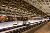A subway train prepares to depart the Farragut West station of the Washington DC metro headed for Vienna.