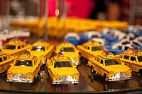 New York taxi toy car displayed in a souvenir store.