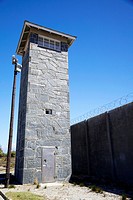Guard tower and wall at Robben Island Prison, Cape Town, Western Cape, South Africa.
