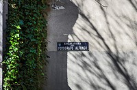 A street plate of a famous Spanish photographer near of the viaduct of Madrid, Spain.