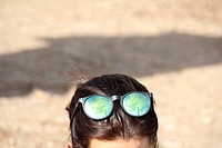detail of woman wearing sunglasses