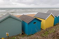 Sea coast with beach huts, Milford on Sea, Hampshire, South England, UK.