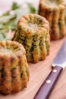 Spinach and salmon canneles, a variation of the traditional cannele recipe from Bordeaux, France
