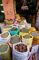 Morocco - Marrakesh. Beans and herbs on sale in market