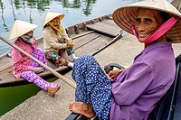 Local Women Wait For Tourists To Take Out On River Boat Trips, Hoi An, Quang Nam Province, Vietnam.