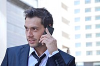 Businessman talking on mobile phone.
