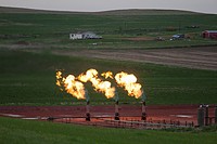 Watford City, North Dakota - Natural gas is flared off as oil is pumped in the Bakken shale formation. The gas is burned because no pipelines have bee...