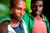 Visually impaired and blind men suffering from trachoma, an infectious disease that can lead to blindness. Trachoma is common in Ethiopia where this p...