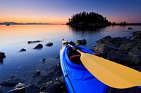 Sea kayak scene at sunrise, Pipers Lagoon Park, Nanaimo, Vancouver Island, British Columbia.