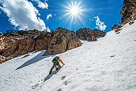 climbing the Chockstone Couloir, AKA the Boy Scout Couloir an alpine route which is rated Grade 3, Class 4 and located on The Grand Mogul in the Sawto...
