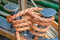Rope with anchored ship.