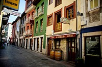 Typical streets of Llanes, with its colorful houses, Llanes, Asturias, Spain.