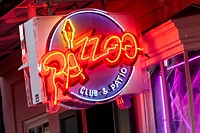 The Neon sign advertising the Pazzoo Night Club, on Bourbon Street, New Orleans.