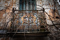 The balcony railing of an abandoned house at Tripoli city. Arcadia, Peloponnese, Greece.