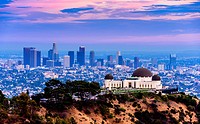 Los Angeles skyline with Griffith observatory at twilight.