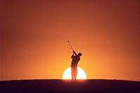 Golfer at Sunset.