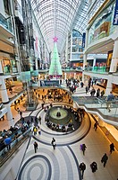 Crowds shopping at Eaton Center in Toronto.