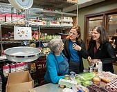 New York City Council Speaker Melissa Mark-Viverto, center, with Councilmember Helen Rosenthal, right, greets a volunteer at the West Side Campaign Ag...