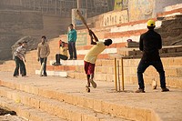Boys playing cricket at the ghats of Varanasi.