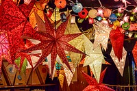 detail of lightened stars in stall at traditional Christmas market hold in city center, Stuttgart, Germany.