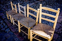 Wicker chairs of different sizes for sale in Sepulveda, Segovia-province, Castilla-Leon, Spain