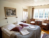 Room at VaÌˆderoÌˆarnas VaÌˆrdshus hotel, Vaderoarna, (The Weather Islands) archipelago, bohuslan region, west coast, Sweden.