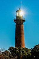 Currituck Beach Lighthouse with Morning Sunlight Reflected.