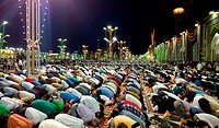 Prayer at the shrine of Imam Ali bin Mussa Alrida In the Iranian city of Mashhad, And the queues of men and women and they are praying to God and bow ...