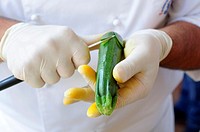 Chef Carving Courgette. . .