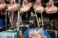 Street vendor sells chicken meat on Bazaar in Old city of Kabul, Afghanistan.