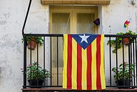 View of some flower pots with Catalonia flag in Balaguer town, Lerida province, Spain
