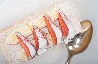fresh baked napoleon strawberry and cream cake dessert.