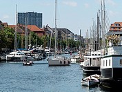 Modern apartments and boats at Christianshavn harbour area,Copenhagen,Denmark.