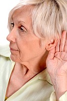 Elderly woman listening.