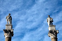 Roman columns topped with statues of Hercules and Julius Caesar at the Alameda de Hercules, Seville, Spain