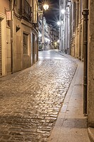 Narrow streets of Teruel old town by night, Teruel, Aragon, Spain.