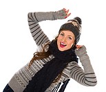 Beautiful young woman wearing woolen outfit, white background.