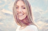 Smiling young adult woman portrait.