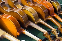 Vintage violins in the antiques fair in Krakow.