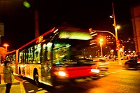 Bus in movement, blurred, at night. Barcelona, Catalonia, Spain.