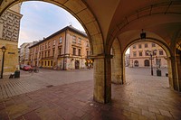 Krakow, Poland. The Szpitalna street near the small market square, perspective view of building´s walls. Image is taken in sunrise time.