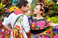 Colorful Mexican costumes - Puerto Vallarta, Jalisco, Mexico. Xiutla Dancers - a folkloristic Mexican dance group in traditional costumes representing...